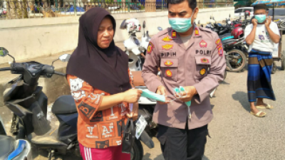 Lindungi Warga dari Abu Vulkanik, Polsek Malingping Polres Lebak Gelar Aksi Bagi Masker